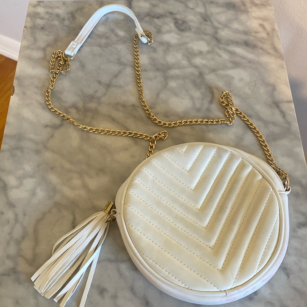 White gold-chained circle purse